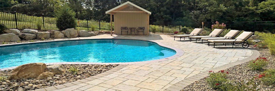 Pavers surrounding the -in-ground pool
provide for a great place to relax!